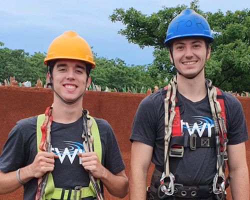 Ben and fellow West Africa intern, Jacob, geared up for some time on the towers.