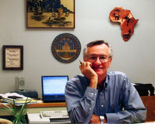 Bill smiles for the camera in his office in 2013 at TWR’s current offices in Cary, North Carolina.
