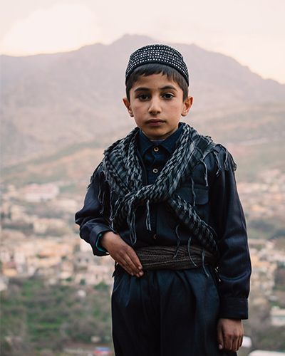 Kurdish boy in Kurdish clothes